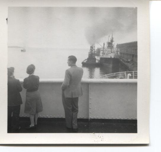 Man and woman on deck of ship Aquitania.