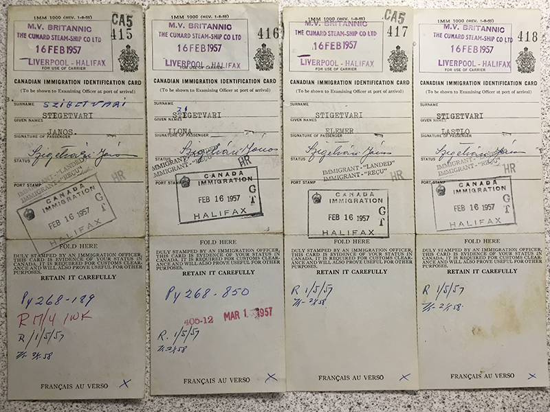 Old Canadian Immigration Identity Cards for a family of four.