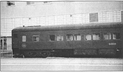 Old photo of train in front of Pier 21.