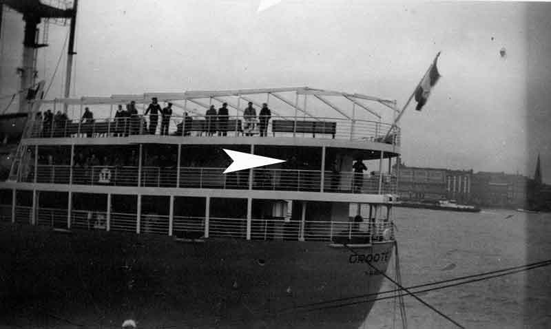 Old picture the ship people standing on the deck.