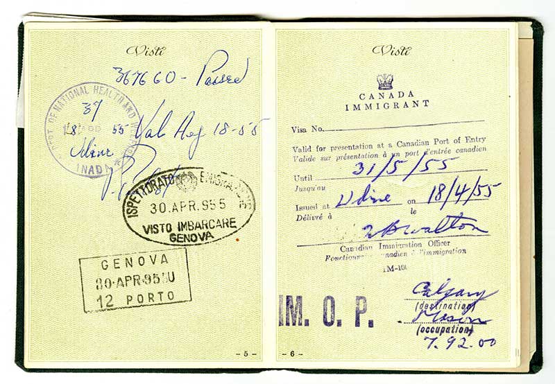 Passport page opened to show several visa stamps as well as the date May 31, 1955.