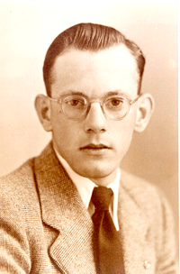 Sepia-toned portrait of a young William, wearing a suit and glasses.