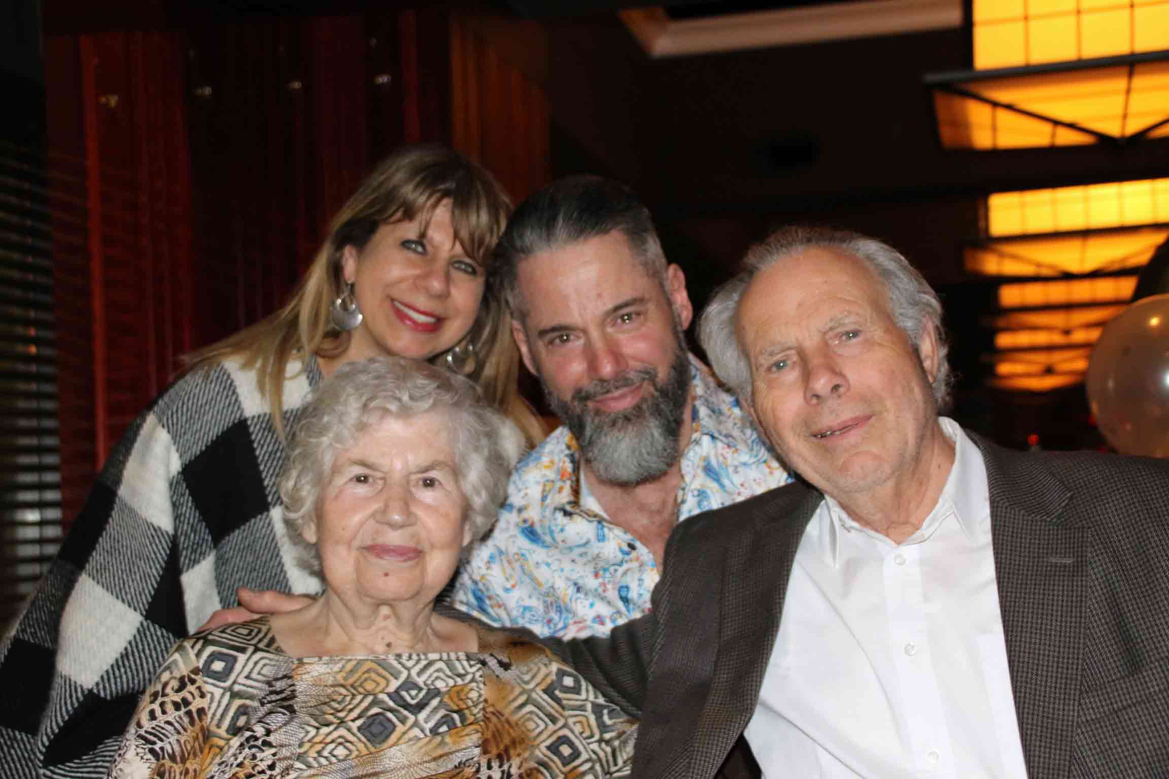A Greek couple with their adult children.