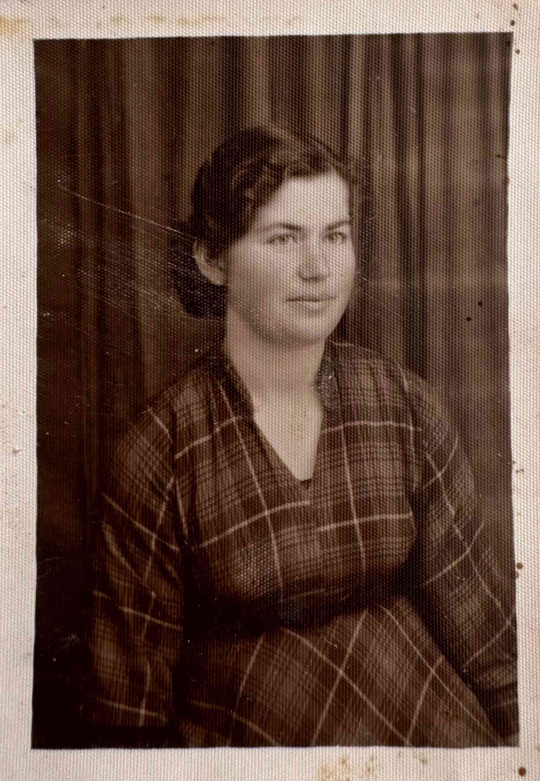 A black and white photo of a Greek lady.